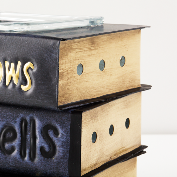 This Book of Spells Wax Warmer Will Make Your Home Smell Hauntingly Good