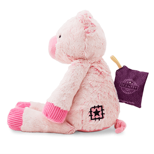 Side view of pink stuffed pig named Piper from Scentsy